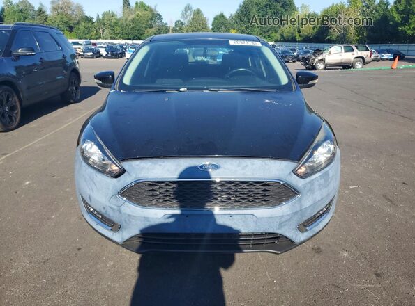 1FADP3M24JL224582 2018 FORD FOCUS Black Вид спереду