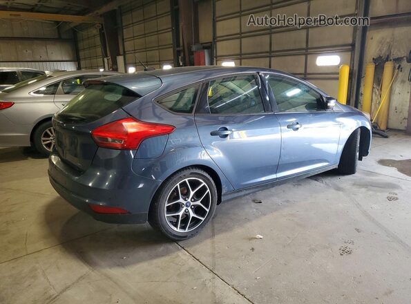 1FADP3M27JL245913 2018 FORD FOCUS Blue Rear right