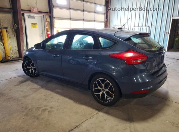 1FADP3M27JL245913 2018 FORD FOCUS Blue Rear left