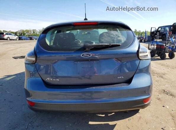 1FADP3M29JL202271 2018 FORD FOCUS Blue Vista trasera