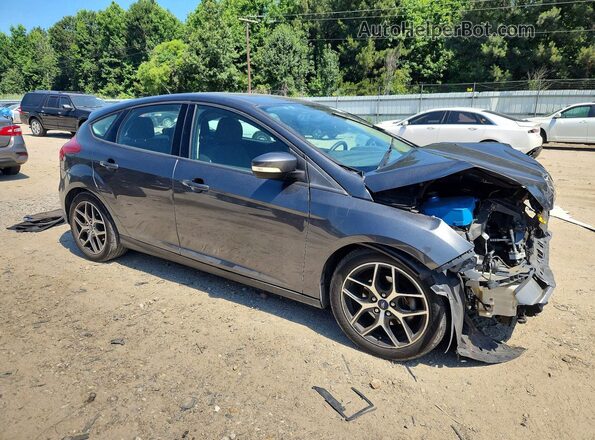 1FADP3M2XHL323174 2017 FORD FOCUS Серый Передняя правая четверть