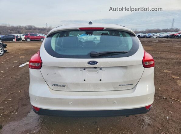 1FADP3N23HL265939 2017 FORD FOCUS White Rear view