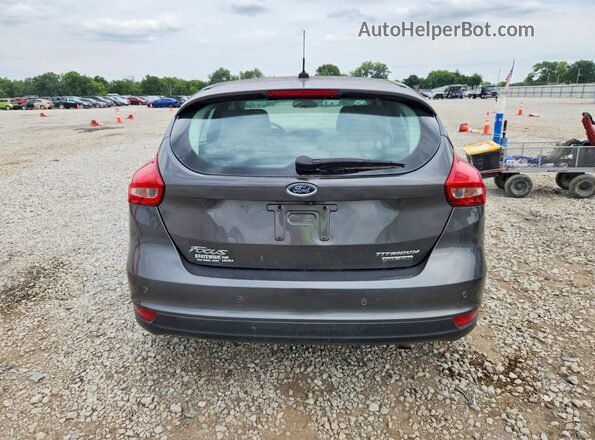 1FADP3N26GL299338 2016 FORD FOCUS Серый Вид сзади