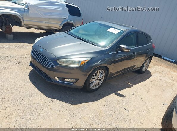 1FADP3N26GL407392 2016 FORD FOCUS Gray Vista tres cuartos delantera izquierda