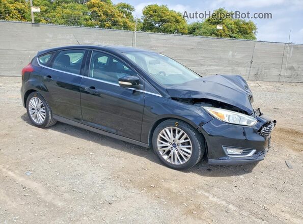 1FADP3N29GL318450 2016 FORD FOCUS Black Przód prawy