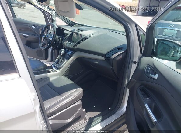 1FADP5CU8GL103397 2016 FORD C-MAX ENERGI Silver Vista interior delantera