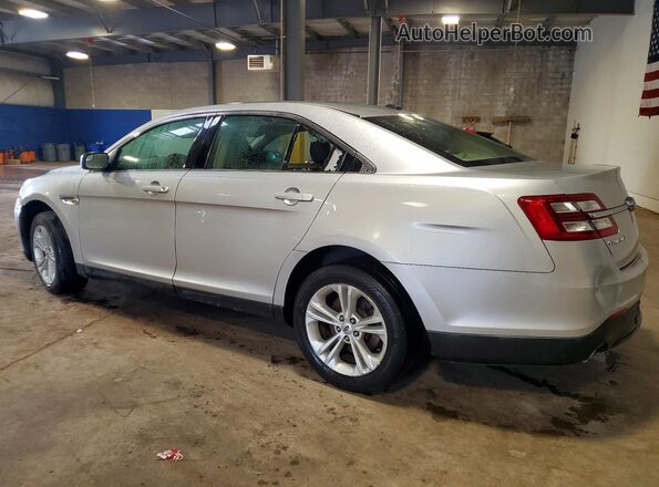 1FAHP2D83GG105679 2016 FORD TAURUS Silver Trasero izquierdo