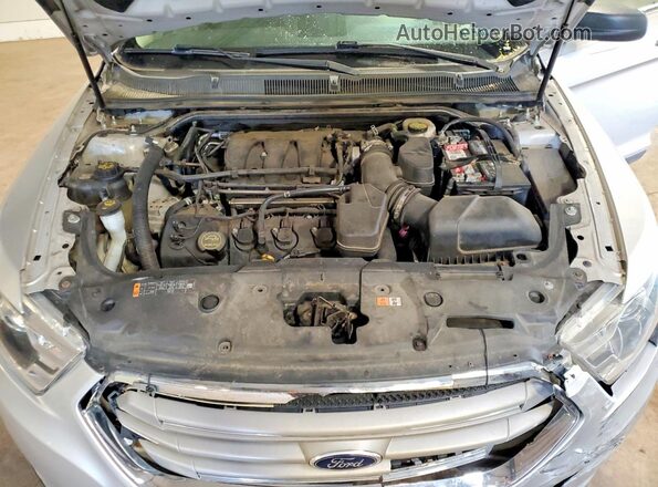 1FAHP2D83GG105679 2016 FORD TAURUS Silver Vista interior trasera