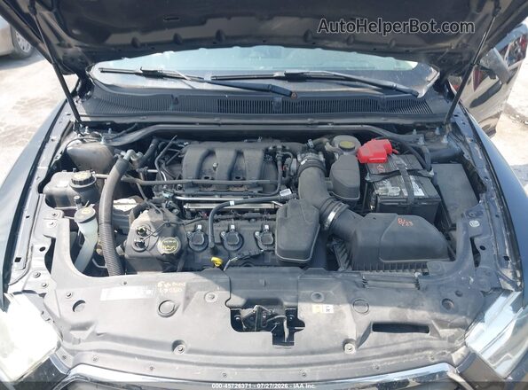 1FAHP2D87HG118761 2017 FORD TAURUS Black Rear view