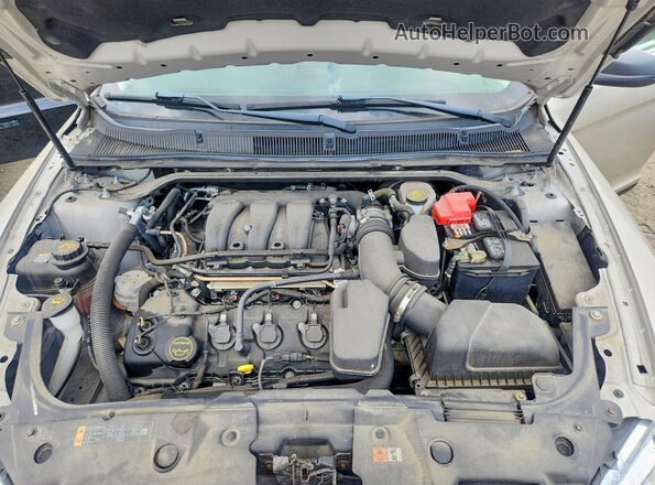 1FAHP2D87JG142113 2018 FORD TAURUS Gold Սալոնի հետևի տեսք