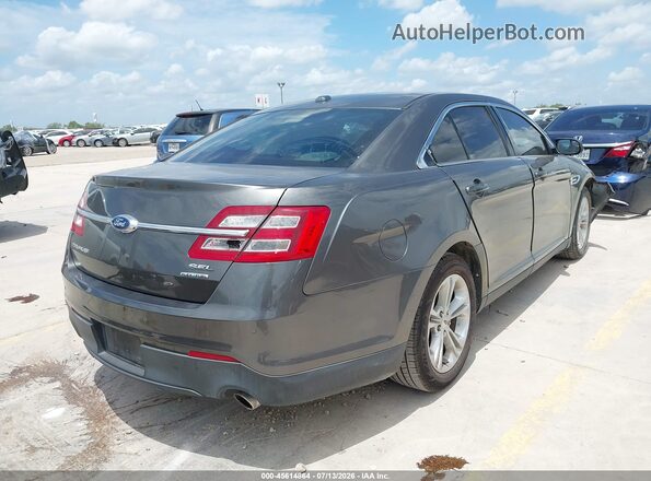 1FAHP2E84GG106872 2016 FORD TAURUS Gray Trasero derecho