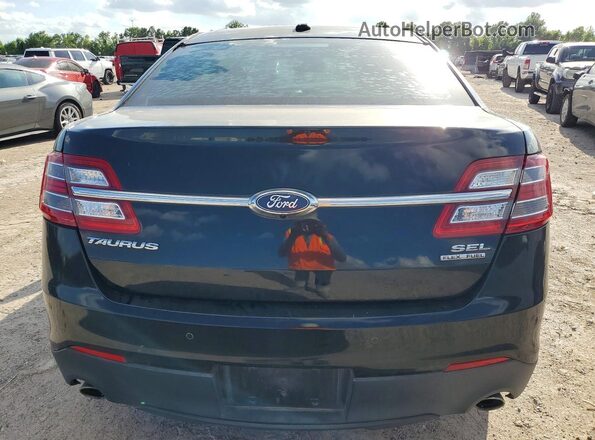 1FAHP2E84HG133281 2017 FORD TAURUS Black Vista trasera