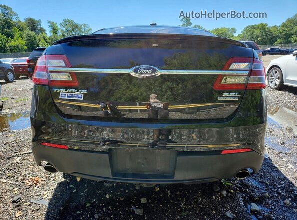 1FAHP2E84JG133108 2018 FORD TAURUS Black უკანა ხედი