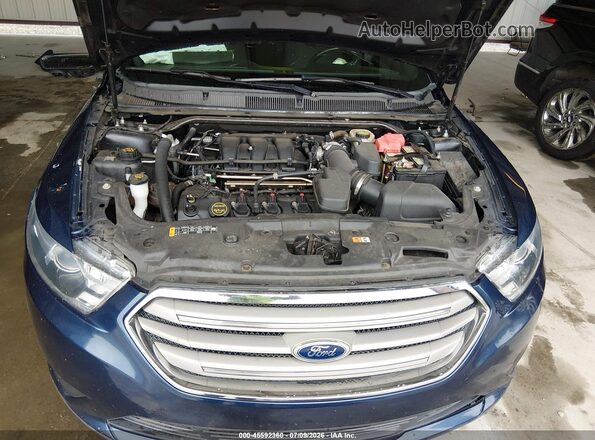 1FAHP2E85GG100935 2016 FORD TAURUS Blue Вид ззаду