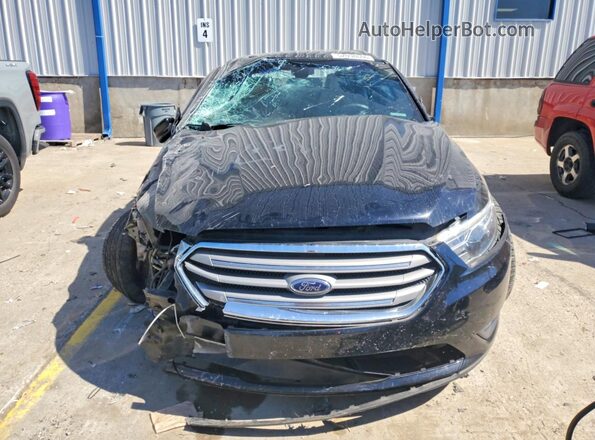 1FAHP2E87GG131507 2016 FORD TAURUS Черный Вид спереди