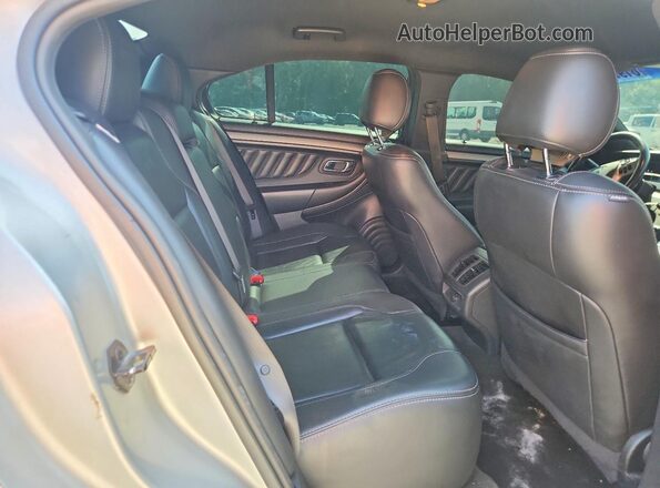 1FAHP2E88GG134075 2016 FORD TAURUS Silver Vista de los asientos traseros