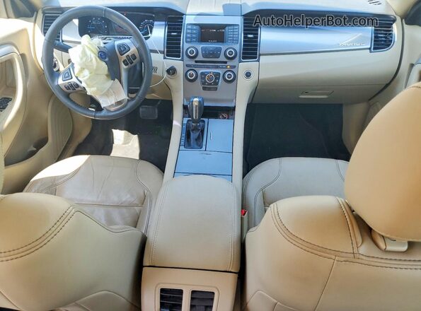 1FAHP2E99HG106392 2017 FORD TAURUS Beige Vista del salpicadero