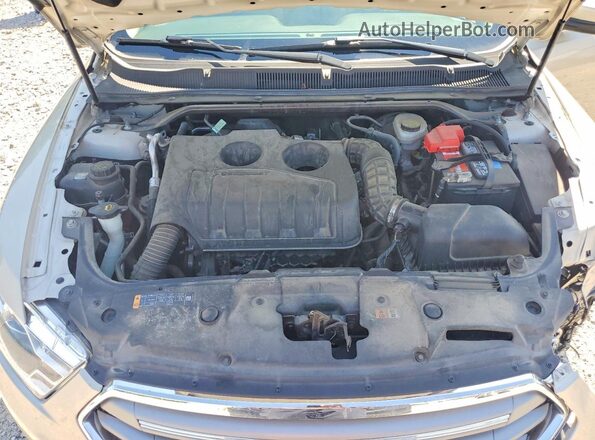 1FAHP2E99HG106392 2017 FORD TAURUS Beige Vista interior trasera