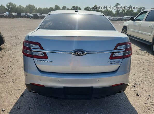 1FAHP2F81HG113200 2017 FORD TAURUS Серебряный Вид сзади