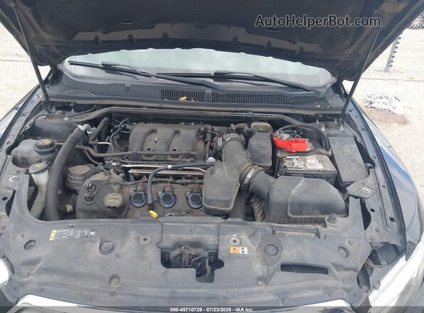 1FAHP2F84GG125792 2016 FORD TAURUS Black Rear view