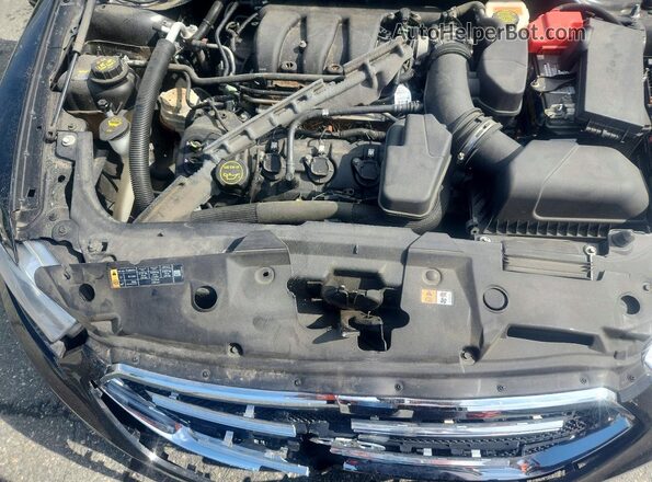 1FAHP2F87HG104467 2017 FORD TAURUS Черный Вид задней части салона
