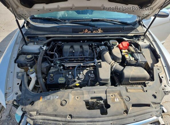 1FAHP2F88JG109490 2018 FORD TAURUS Silver Rear interior view