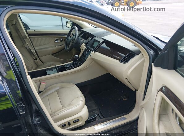 1FAHP2F8XHG104446 2017 FORD TAURUS Черный Вид салона спереди