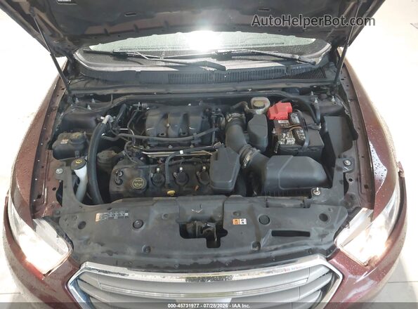 1FAHP2H85GG150066 2016 FORD TAURUS Maroon Rear view
