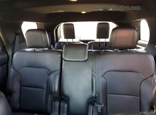 1FM5K7DH9HGD64215 2017 FORD EXPLORER Orange Rear seats view