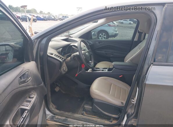 1FMCU0F70HUA99084 2017 FORD ESCAPE Gray Widok wnętrza z tyłu