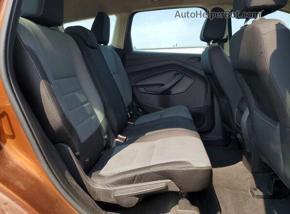1FMCU0F70HUB97497 2017 FORD ESCAPE Orange Rear seats view