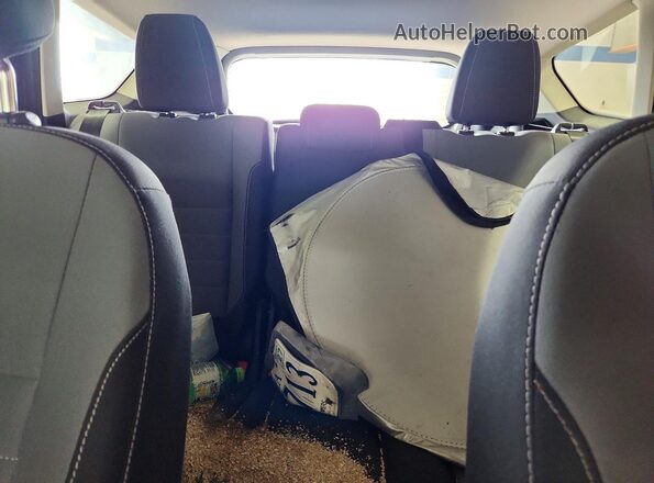 1FMCU0F73HUC19847 2017 FORD ESCAPE Orange Rear seats view