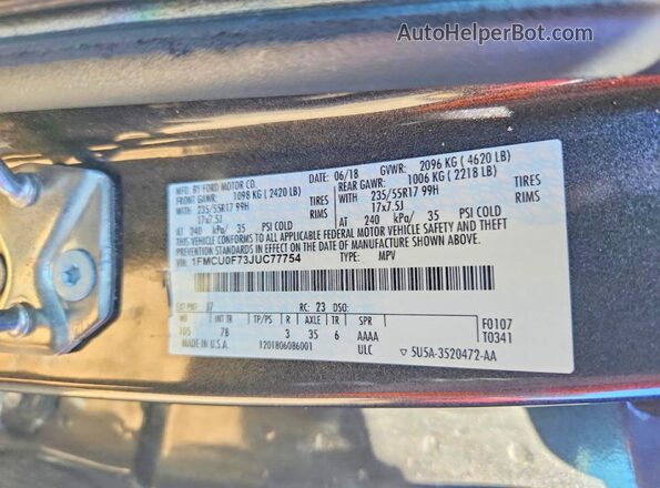 1FMCU0F73JUC77754 2018 FORD ESCAPE Black Widok naklejki z numerem VIN