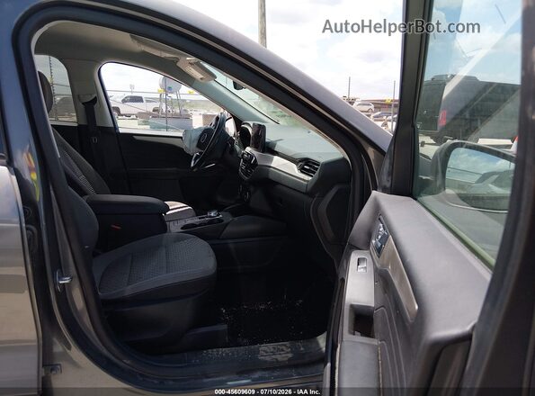 1FMCU0G64MUA00766 2021 FORD ESCAPE Gray Widok wnętrza z przodu