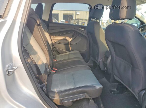 1FMCU0G73GUB04694 2016 FORD ESCAPE Silver Widok wnętrza z tyłu