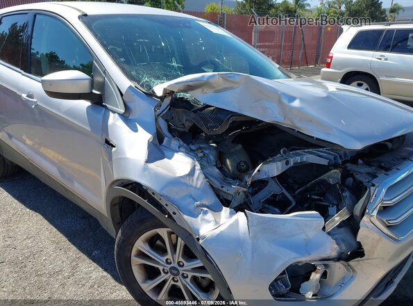 1FMCU0G95HUB46772 2017 FORD ESCAPE Серебряный Вид задней части салона