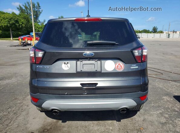1FMCU0G97HUD44754 2017 FORD ESCAPE Gray Vista trasera