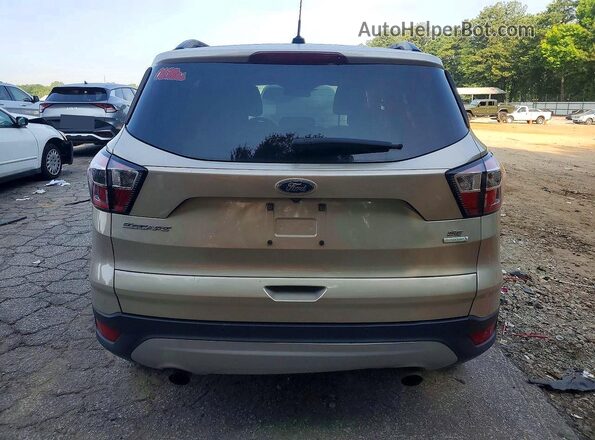 1FMCU0GD0HUD04620 2017 FORD ESCAPE Gold Widok z tyłu