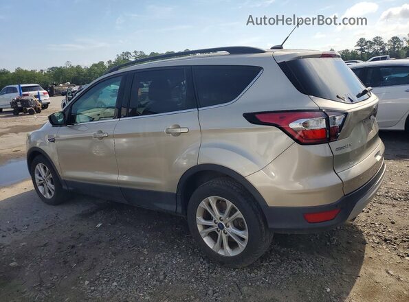 1FMCU0GD0HUD26634 2017 FORD ESCAPE Gold Rear left