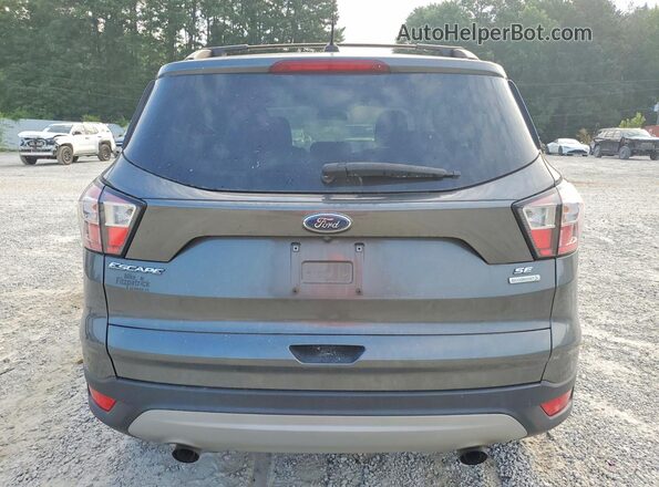 1FMCU0GD0JUD25974 2018 FORD ESCAPE Gray Vista trasera