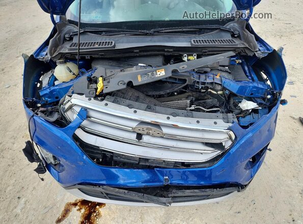 1FMCU0GD1HUB36826 2017 FORD ESCAPE Blue Vista del compartimento del motor
