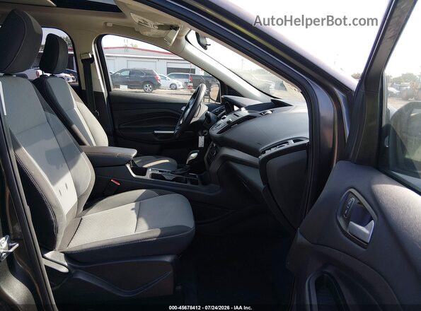 1FMCU0GD2JUB61711 2018 FORD ESCAPE Gray Widok wnętrza z przodu