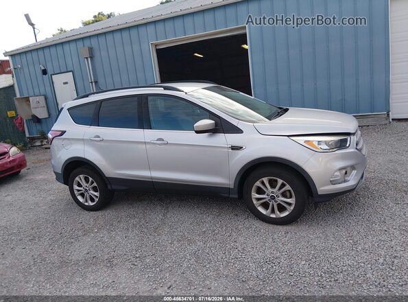 1FMCU0GD2JUC46791 2018 FORD ESCAPE Silver Vista interior trasera