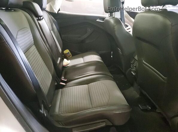 1FMCU0GD3HUA12458 2017 FORD ESCAPE Silver Rear seats view