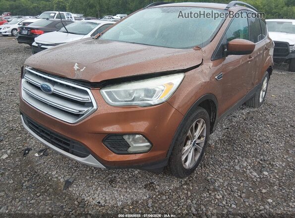 1FMCU0GD3HUA57576 2017 FORD ESCAPE Оранжевый Вид щитка приборов