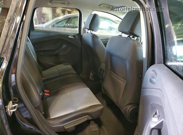 1FMCU0GD4HUA91297 2017 FORD ESCAPE Black Вид задньої частини салону