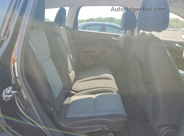 1FMCU0GD4HUC46348 2017 FORD ESCAPE Black Widok wnętrza z tyłu