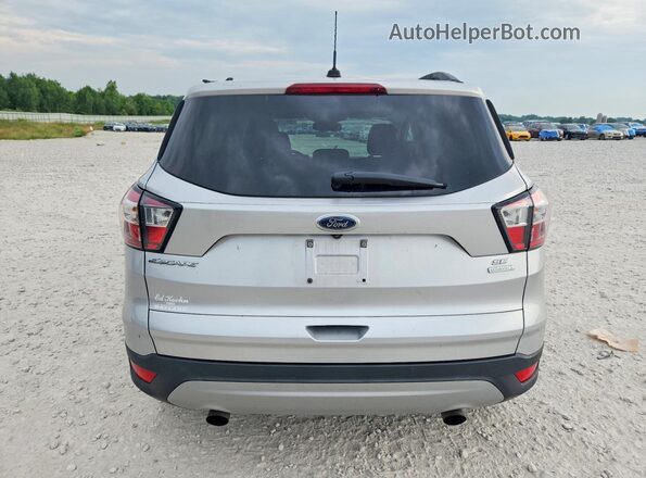 1FMCU0GD4JUA76076 2018 FORD ESCAPE Silver Rear view