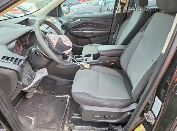 1FMCU0GD4JUB62956 2018 FORD ESCAPE Black Front interior view
