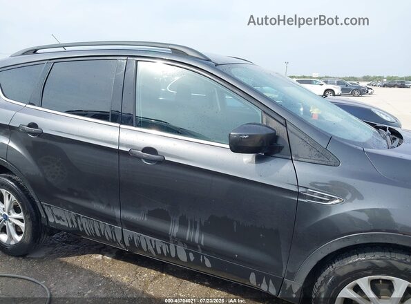 1FMCU0GD4JUD07557 2018 FORD ESCAPE Gray Rear interior view